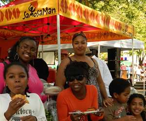 family enjoying samosas